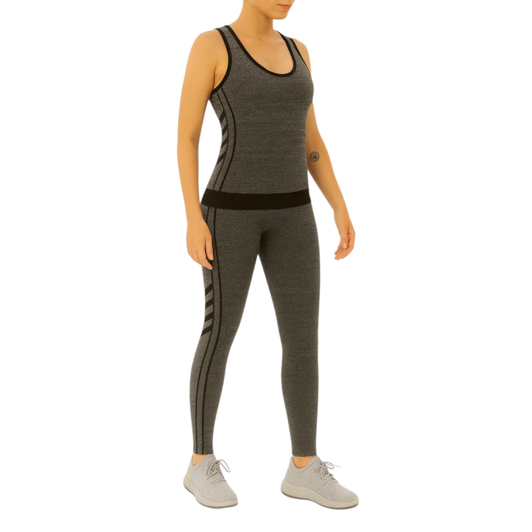 Women's seamless grey and black gym leggings and tank top activewear gymwear set with stripe detailing.